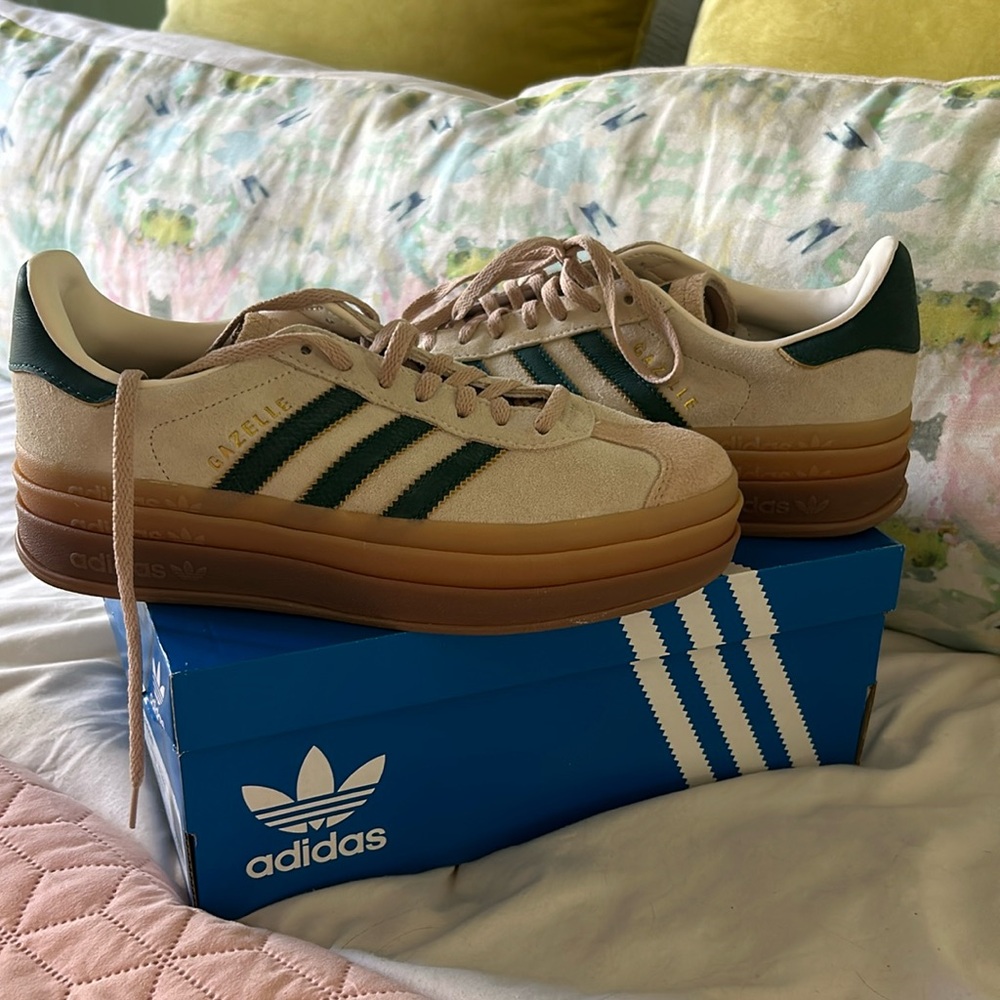 Brand new with box. Never worn size 7 but these run 1/2 size big.